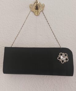 Cartera de mano negra , flor cristal
